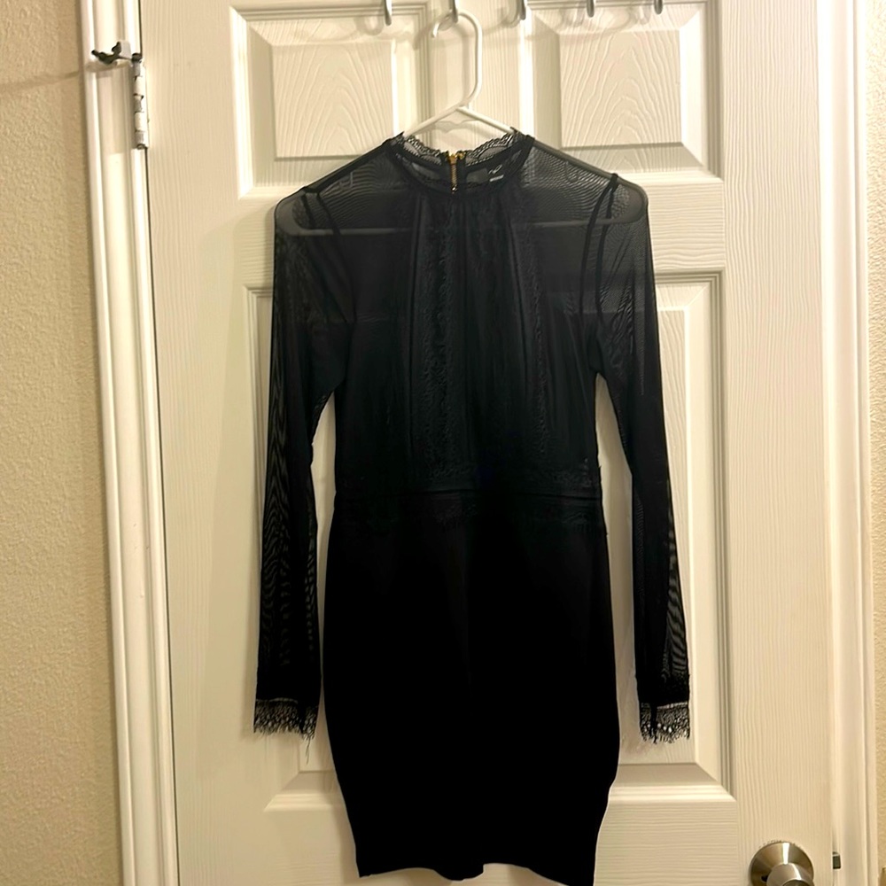 Lacy black sectional dress. Size S